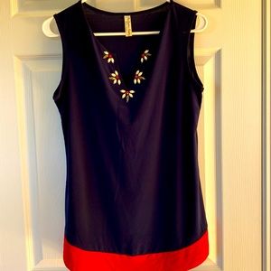 Perfect for the office. Beaded V-neck embellishment. Beautiful polyester spandex